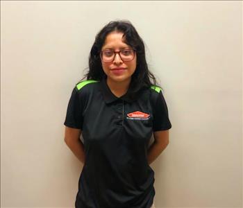 female posing in black uniform